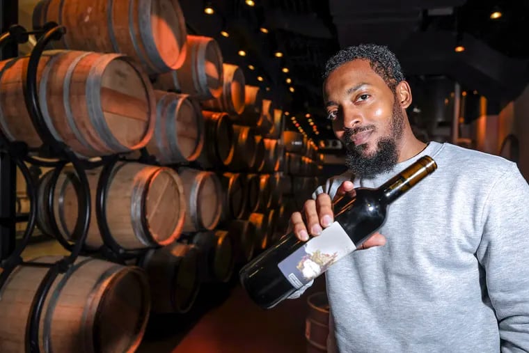 Chill Moody poses for a portrait with his new wine at City Winery Philadelphia on Thursday, March 21, 2024. The new wine will debut on Saturday.