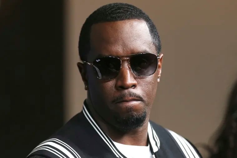 In this May 30, 2018, file photo, Sean "Diddy" Combs arrives at the L.A. Premiere of "The Four: Battle For Stardom" at the CBS Radford Studio Center in Los Angeles. Combs' lawyer said Tuesday that the searches of his Los Angeles and Miami properties by federal authorities in a sex-trafficking investigation were ”a gross use of military-level force" and that Combs is “innocent and will continue to fight" to clear his name.