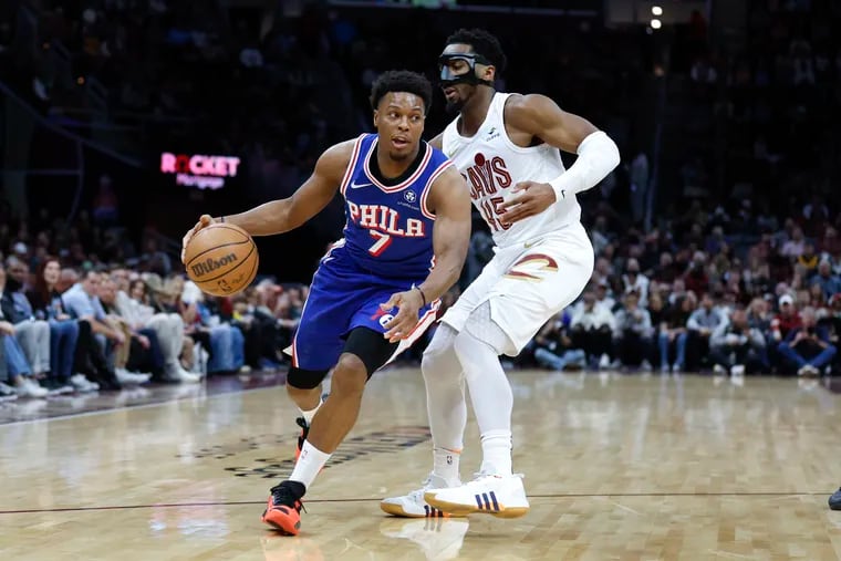 Kyle Lowry (left) led the Sixers in scoring with 23 points.
