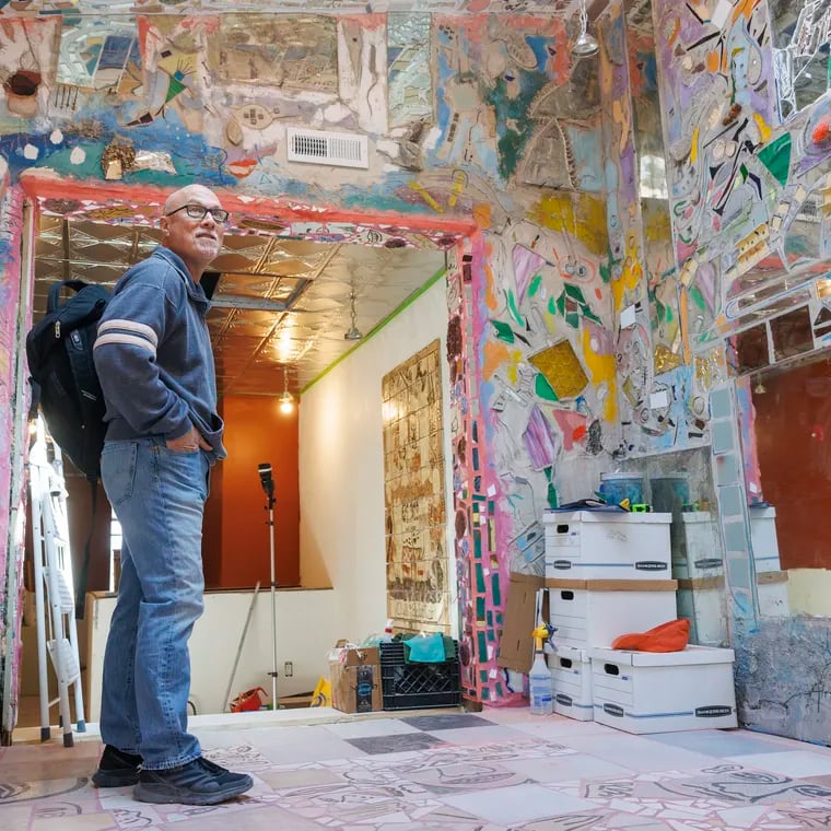 Ken Silver of Jim’s Steaks in a room filled with glittery mosaics mainly by Philadelphia artist Isaiah Zagar. An expansion exposed previously hidden work by Zagar.