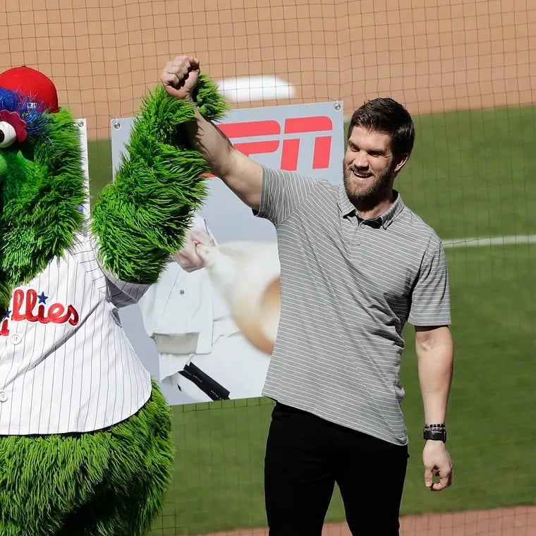 Bryce Harper became fast friends with the Phanatic at his introductory news conference with the Phillies in 2019.