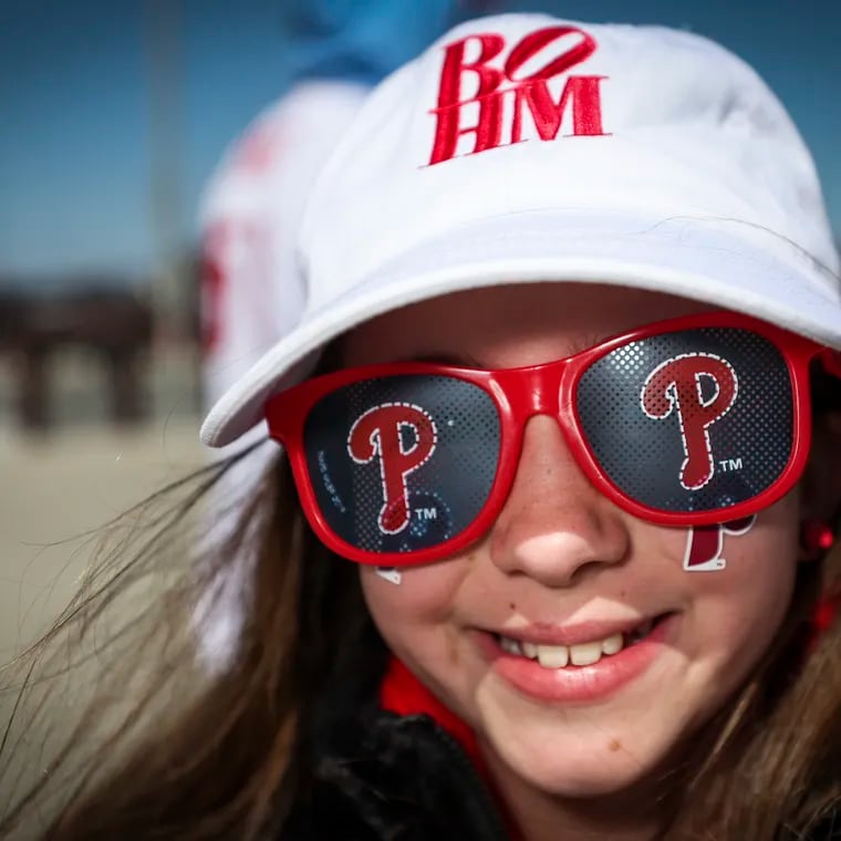 Evelyn Amalfitano, 11, poses for a portrait outside of Citizens Bank Park on opening day in Philadelphia on Friday, March 29, 2024.