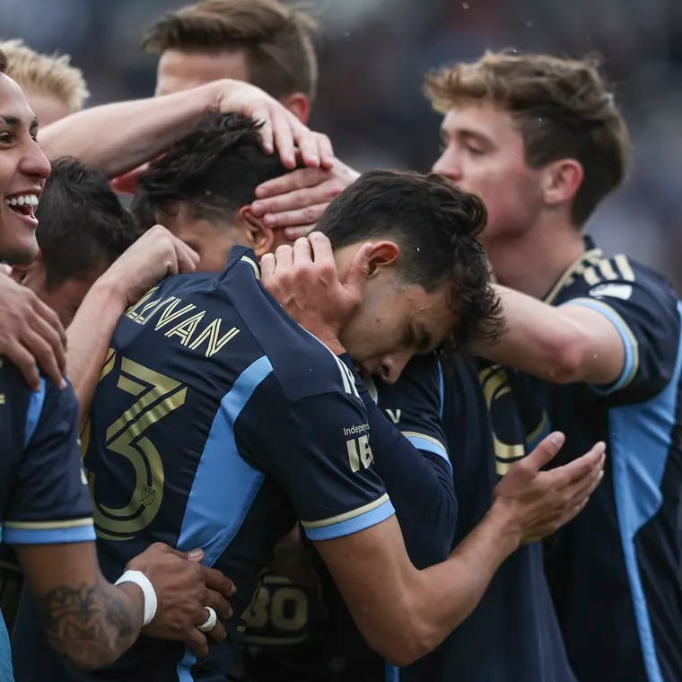 Union players celebrated with Julián Carranza after his goal sealed Saturday's 2-0 win over Minnesota United.